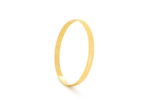 22K gold bangle eclisse curve collection with elegant curved band design, luxury jewellery Chrysus Golds